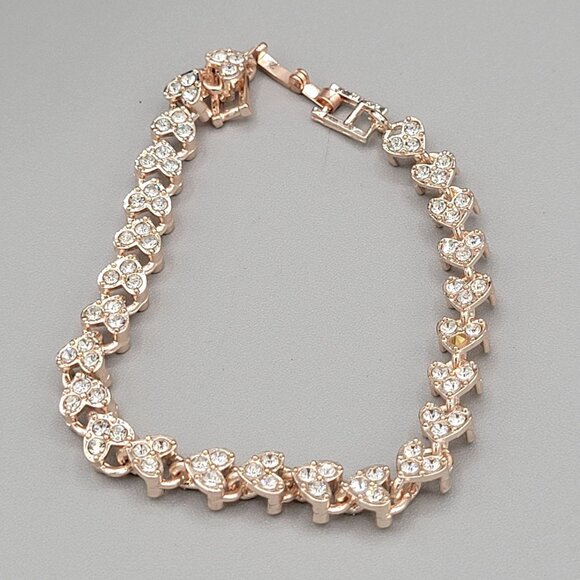 Elegant Rose Gold Tone Heart Tennis Bracelet With Clear Crystal Accents - Picture 2 of 6